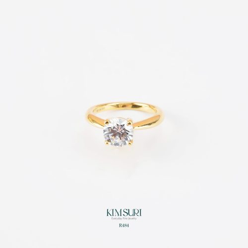 Nhẫn vàng 10k trơn đính đá chủ R439